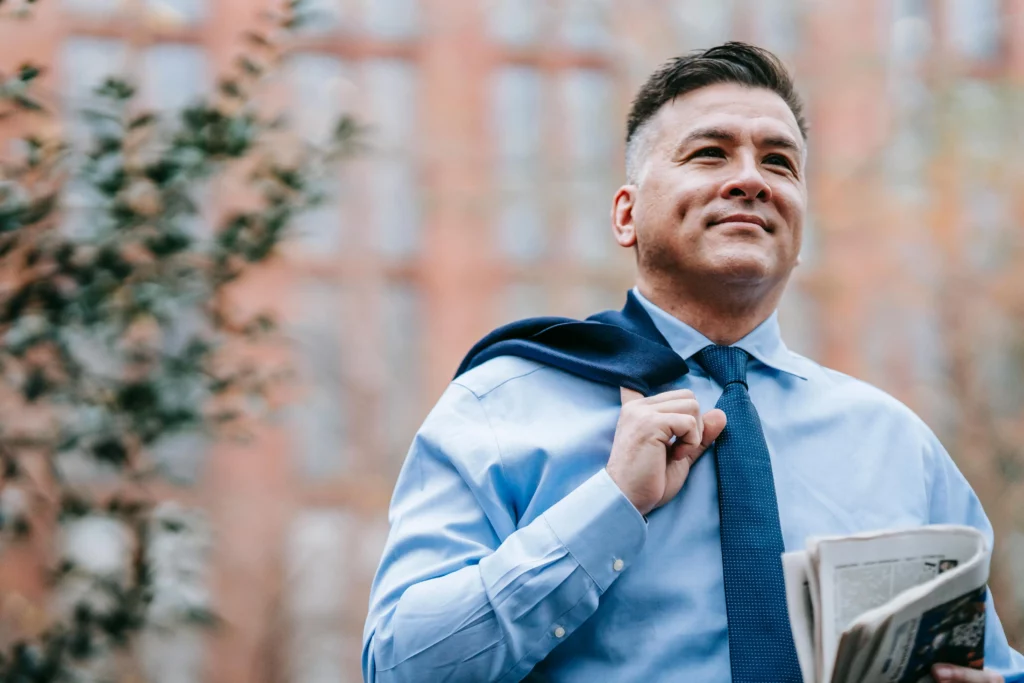 A man with very high self-confidence dressed in neat suit heading to work